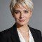 Portrait of a businesswoman with short blonde hair